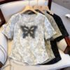 21-1213 (9) เสื้อยืดคอกลมลายผีเสื้อ